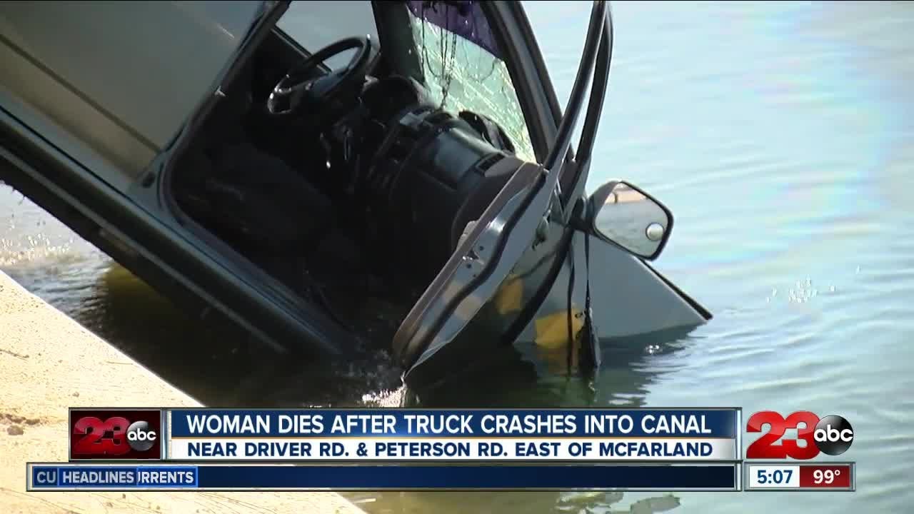 Woman dies after truck crashes into canal - YouTube