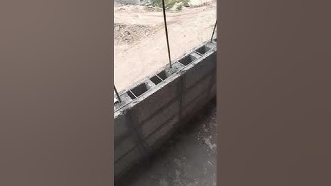 Hollow block work with wire mesh and steel reinforcement #construction#hollowblocks #walls