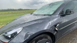 body damage to tesla model 3 from a massive hail storm