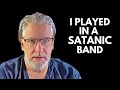 An artist in a satanic band finds the holy spirit