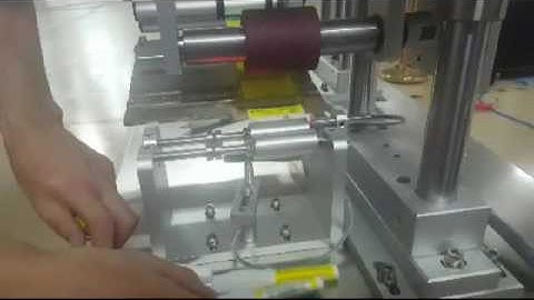 Semi automatic label applicator machine for pen labeling