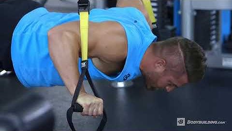 Feet Elevated TRX Push Up   Exercise Videos & Guides   Bodybuilding com