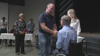 Gov. Abbott presents checks to victims of deadly July flooding in Central Texas