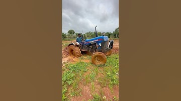 Powertrac tractor stuck in mud #shorts #trending #tractor
