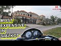 Looking at big houses in richest part of sialkot  pakistan motorcycle ride pov tour  cantt