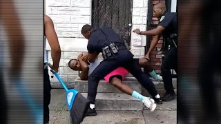 Baltimore officer resigns after video shows him punching man