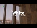 White – on a building you like to hug (audio description)