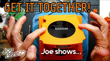 Joe shows: GameCube lid reassembly - top shell with hinge and catch mechanism