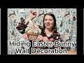 Affordable hanging Easter decoration with Easter Bunny hiding behind the basket