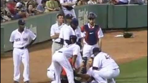 Mookie Betts Makes the Catch and Goes Over the Wall