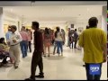 Artist show their work in karachis local art gallery