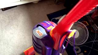 Dyson DC01 De Stijl Vacuuming