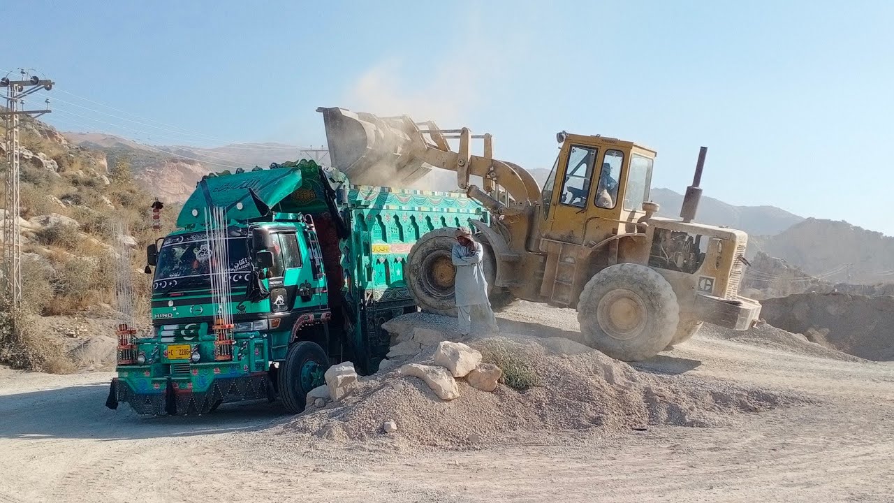 Loading Damper Loading damper with caterpillar wheel loader - YouTube