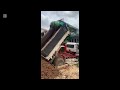 Rescue the truck from the pit with excavator and crane truck