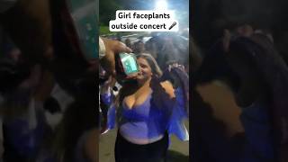 Girl faceplants outside concert