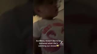 Hillarious Baby doesnt like getting called while watchimg a show