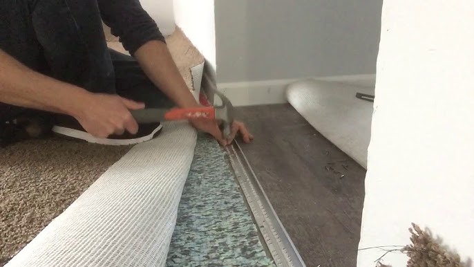 How to install a carpet to vinyl transition strip on concrete - YouTube