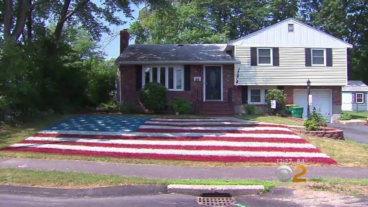 Massachusetts man transforms front lawn into American flag for July 4th