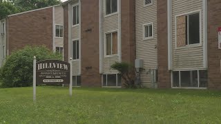 Woman arrested for murder after man found with fatal gunshot wound at Hillview Apartments in Canton