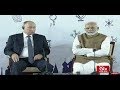 PM Modi and Russian President Vladimir Putin interact with a group of children