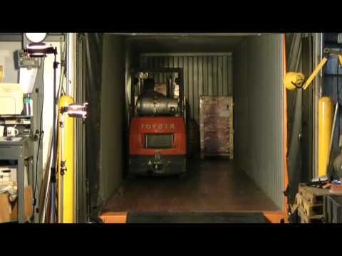 Video: Vad är en sidolastare för en container?