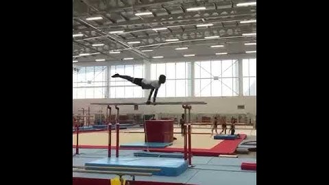 DOUBLE FRONT HALF TWIST DISMOUNT ON PBARS BY DON OSBOURNE!