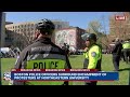 Police officers surround encampment of protesters at Northeastern University