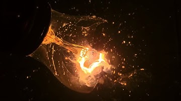 Water & Electricity: Light Bulb Violently Explodes with Vaporizing Tungsten (Slow-mo)