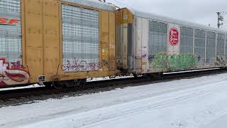 Csx auto rack train in Homestead with GT and Burlington northern car