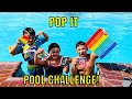 POP IT Pool Challenge!! Simple Dimple, Monkey Noodles & more! See who pops them the fastest!!