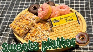 #fillingplatterwithsweets #minidonuts #asmr #satisfying #peanutcandy #sweets #candy #donuts #video