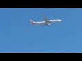 PLANE SPOTTING: American Airlines taking off above Sydney