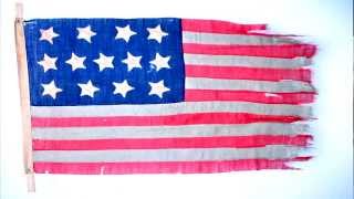 Work and a US 13 Star Flag Fabric Of A Revolution Recreating A 13 Star Flag