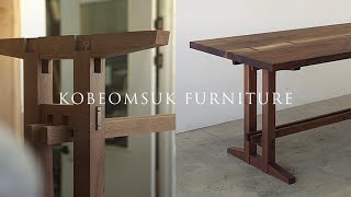 Kobeomsuk furniture-Walnut live edge trestle table