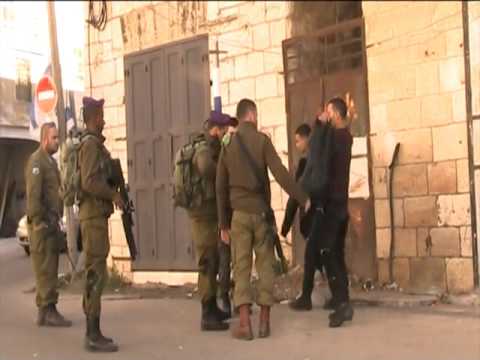 soldiers detain bodycheck and harass residents who pass 640x360