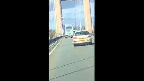 Lorry blown over on bridge