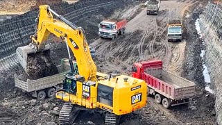 Excsvator Caterpillar 6015b loading Construction Trucks - Sotiriadis