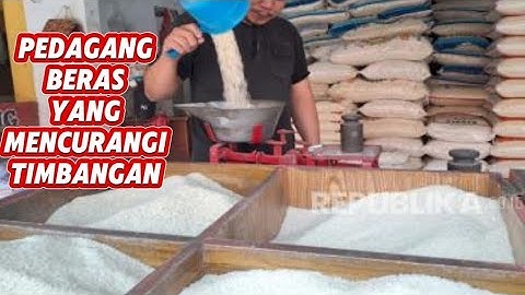 pedagang yang mencurangi timbangan