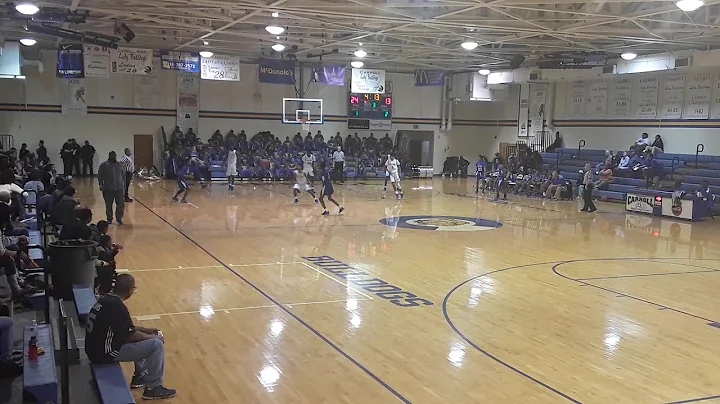 A double dunk by sophomore Deonte Edwards and Seni...