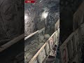 Two vibrating ore discharge machines are connected in series for conveying