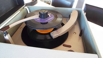 Columbia 3 speed automatic tube amplifed record player playing 45