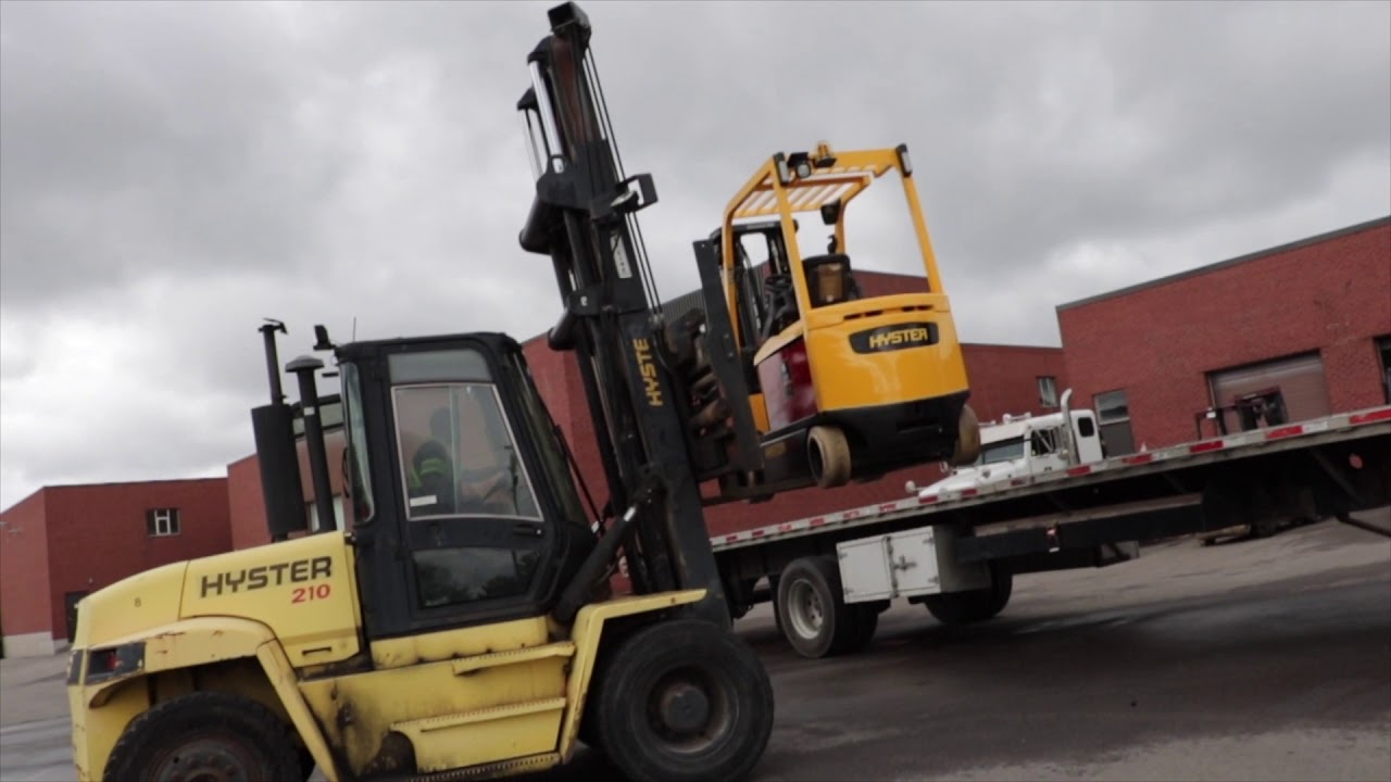 How to put a Forklift on a trailer !!! Delivery preparation for our