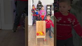 Christmas ball throwing challenge! Most balls in the container wins! #christmasgames #familygames @SoCassie