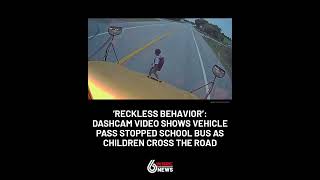 Dashcam catches driver passing stopped school bus