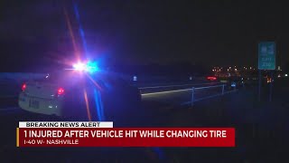 Man hit while changing tire on I-40