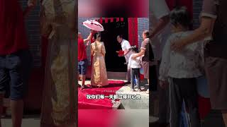 Local wedding traditions: Besides tossing the chicken, there's also the umbrella spinning. Netize...