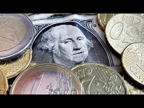 Euro reaches parity with dollar for the first time in 20 years