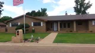 OUTSIDE FRONT OF 517 E 17TH LANE, PORTALES NM