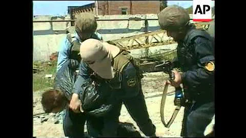 Chechnya - Russian Forces Disarm Grozny Rebels