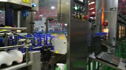 SCALIGERA PACKAGING Sleeve Applicator and Shrink Tunnel BODY for PET Bottles 26000 bph